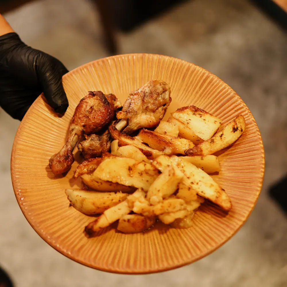 Roast chicken with potatoes